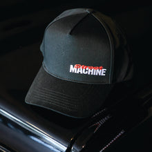 Black cap with Street Machine masthead text on a dark background